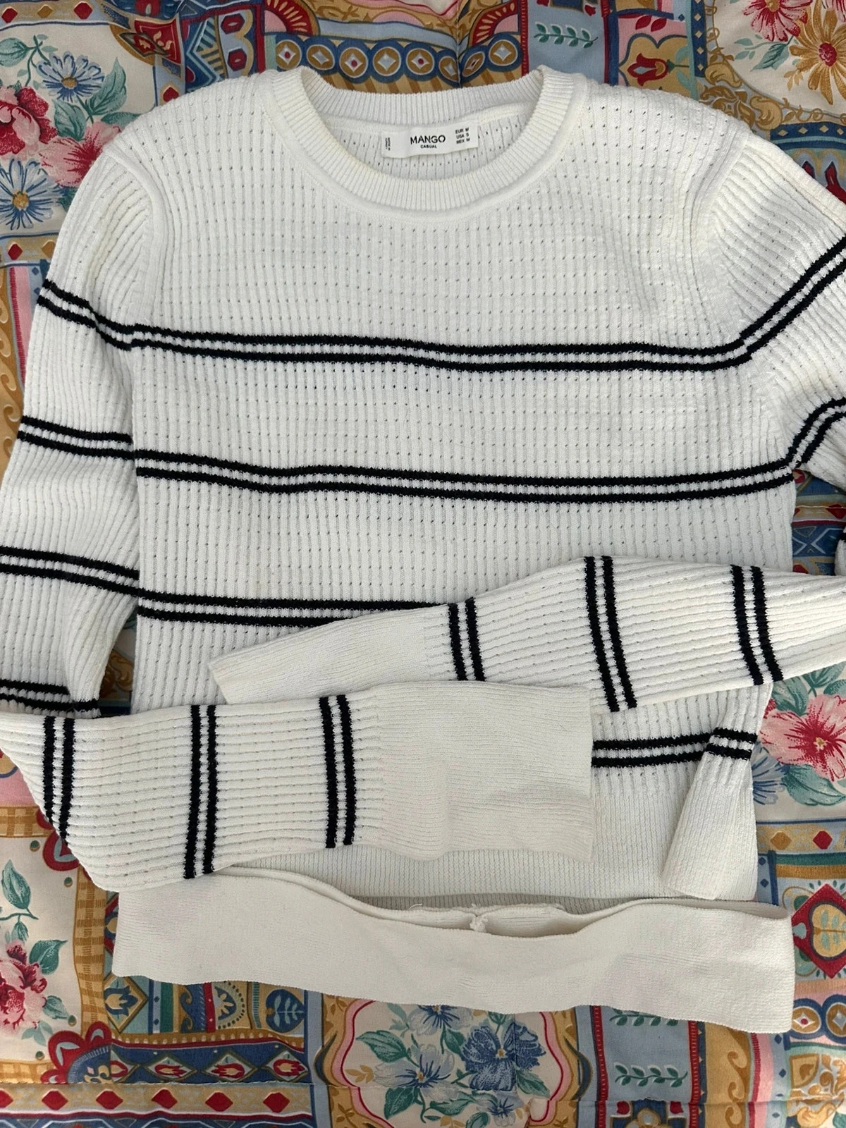 Suéter canalé rayas marca Mango